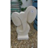 A hand carved limestone stylized elephant sculpture - Height 82cm