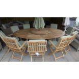 A Bramblecrest Oxford 250cm x 175cm oval table with 100cm lazy susan,