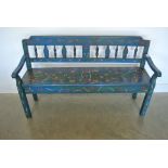 An antique pine bench with hand painted floral decoration - Width 146cm