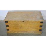 A Victorian pine trunk, metal bound with metal handles and hinged lid - 89cm x 44.5cm x 42.