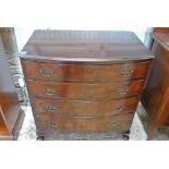 A circa 1930's mahogany and walnut bow front chest of four drawers - Height 81cm x 77cm x 46cm