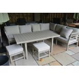 A Bramblecrest Norfolk aluminium sofa set with casual dining table with two dining stools