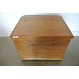 A large stripped pine blanket box with centre hinged top, original large metal handles,