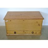 An early 19th century stripped pine mule chest with single exterior drawer to base and interior