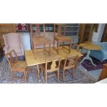 A blonde oak refectory style dining table - Height 70cm x 91cm x 160cm - and six single chairs -