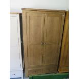 A modern oak double wardrobe with a base drawer - 200cm x 106cm - as new