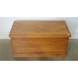 A modern pine trunk with metal handles and hinged lid - 86cm x 43cm x 43cm high - made by a local