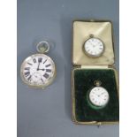 Two silver pocket watches and a Goliath type watch - Diameter 7cm - all needing attention