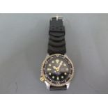 A Citizen Automatic Divers watch, black dial with illuminous markers,