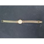 A 9ct Accurist Ladies bracelet watch - Width 16mm - Total weight approx.