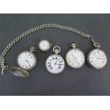 Two silver pocket watches one on a base metal chain,