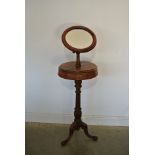 A Victoria mahogany shaving stand with mirror to top