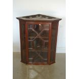 An astragal glazed mahogany corner cupboard,