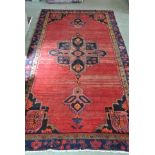 A hand knotted rug - 2.87m x 1.