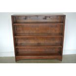 A circa 1930's oak open bookcase with adjustable shelves - 122cm x 28cm x 120cm