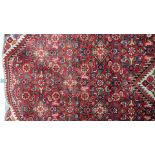 A hand knotted Hamadan rug - 2.97m x 1.