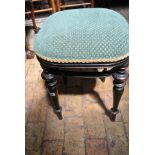 A Victorian ebonised mahogany green/gold upholstered stool