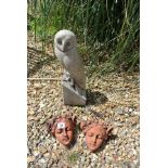 A life sized cast stone figure of a barn owl - Height 41cm - together with a pair of girls with
