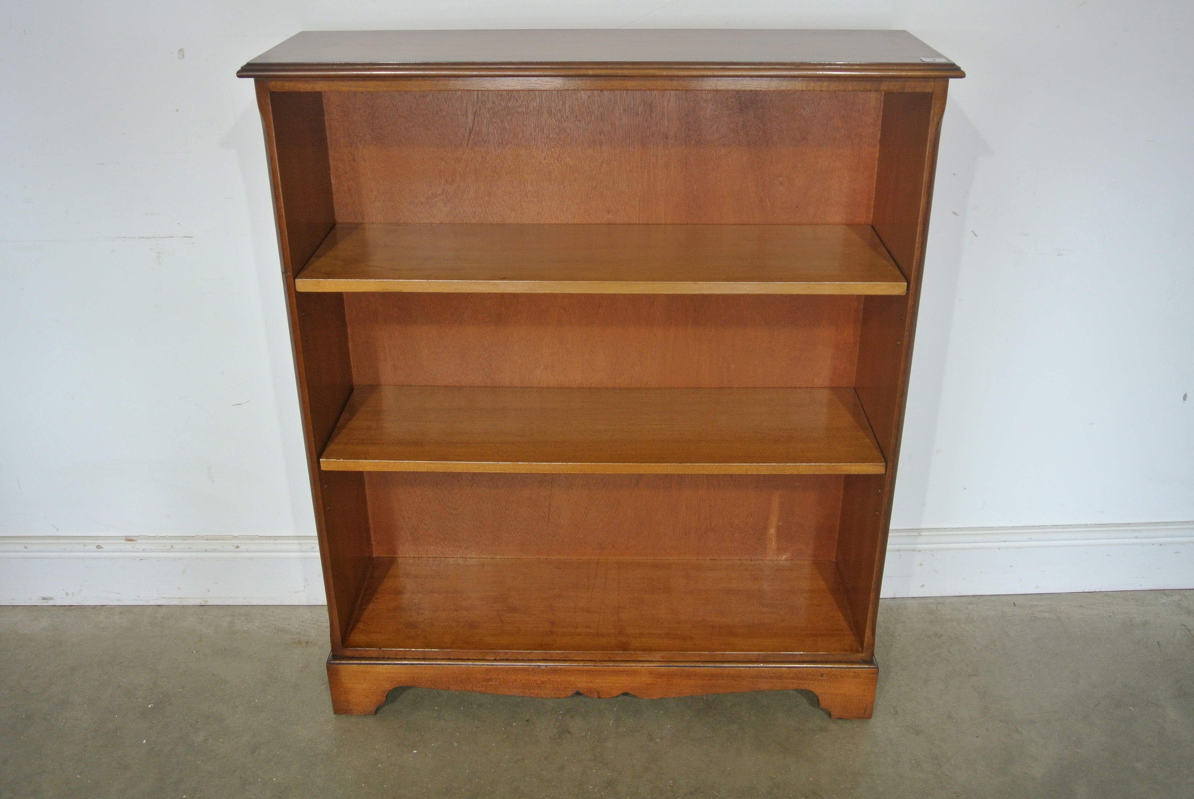 A reproduction yew wood bookcase with adjustable shelves - 92cm x 28cm x 107cm