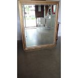 A modern gilt mirror - 137cm x 108cm