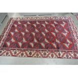 A hand knotted Turkman rug - 2.77m x 1.