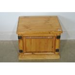 A small pine metal bound trunk with hinged lid - 54cm x 42.