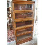 A walnut Globe Wernicke five section stacking bookcase - Height 183cm x 87cm - top two sections