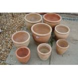 Eight Terracotta garden pots