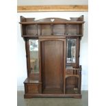 An Arts and Crafts mahogany mirror back hall stand - Height 196cm x 142cm x 43cm