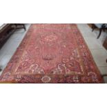 A hand knotted woolen Heirz rug - 3.45m x 2.