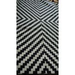 A black and white contemporary rug - 2.30m x 1.