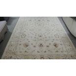 A fawn ground Ziegler type carpet machine made - 3.40m x 2.