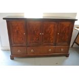 A Stanley mahogany effect server cabinet with a black granite top - Height 115cm x 179cm x 47cm