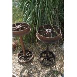 A pair of 19th century cast iron coalmine truck wheels salvaged from a mine near Greymouth,