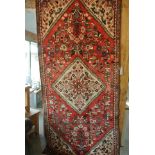 A hand knotted Hamadan rug - 2.65m x 1.