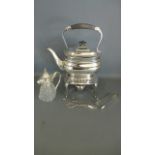 A silver plated kettle,