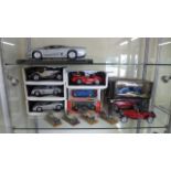 A collection of model vehicles Burago Mercedes 300SL 1964, Mercedes SSK 1928, Bugatti EB110 1991,