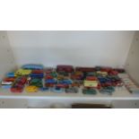 A quantity of mainly Dinky toys Diecast model vehicles with some Matchbox amongst,