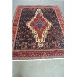 A hand knotted woolen Bijar rug - 1.90m x 1.