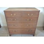 A Georgian oak five drawer chest on bracket feet - Height 105cm x 103cm x 53cm