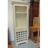 A Neptune shaker style bookcase with a wine rack under - the cornice has some damage - 210cm x 80cm