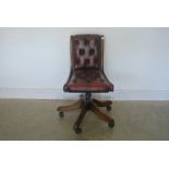 A modern mahogany effect buttoned maroon leather desk chair