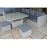 A Bramblecrest all weather Molly modular sofa with mini adjustable casual dining table and two