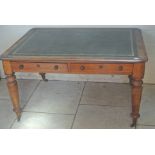 A Victorian mahogany library table with a leather inset top and two drawers - Height 73cm x 130cm x