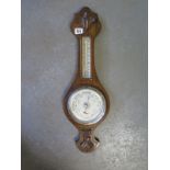 An oak aneroid barometer with thermometer - Height 58cm