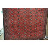 A hand knotted woolen Turkman rug - 3.00m x 1.