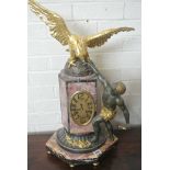An Art Nouveau Marble eight day striking mantle clock surmounted by an eagle in working order,