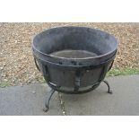 An iron bowl on stand - Height 39cm x Diameter 52cm