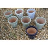 A set of seven glazed plant pots in various colours - Height 18cm