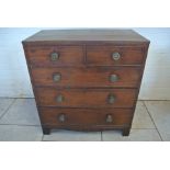 A Georgian mahogany four drawer chest on bracket feet - Height 97cm x 90cm x 48cm